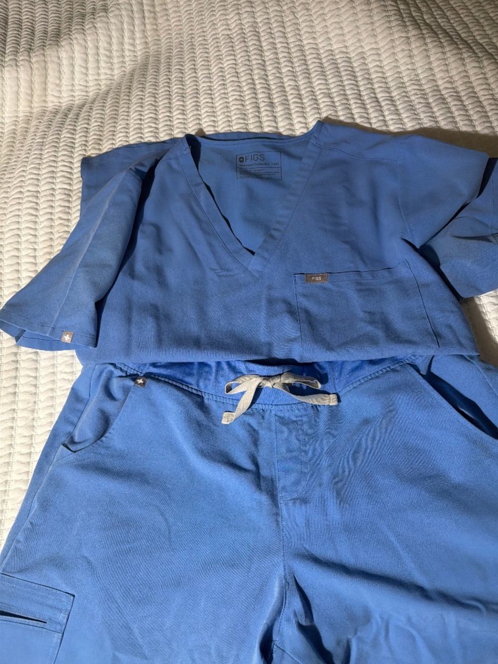 Figs woman’s baby blue scrub set.
